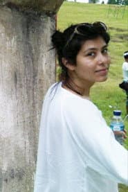 Isabelle Patrice as Woman on Photograph