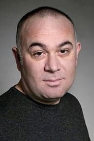 Güven Kıraç as Aziz