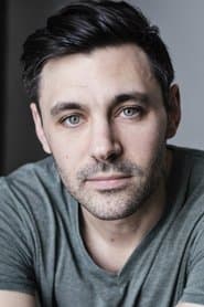 Liam Garrigan as Reggie Nigri