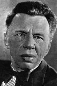 Vasiliy Toporkov as cloakroom attendant