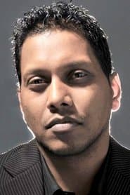 Oudesh Rughooputh as Réceptionniste