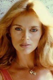 Sybil Danning as Erica Moore