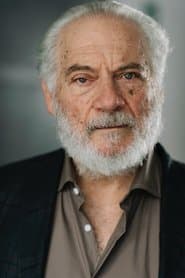 Giorgio Colangeli as Ettore Derkel