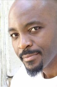 Emile Abossolo M'bo as Ministre d'Etat