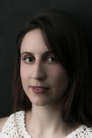 Electra Sarri as Woman on beach