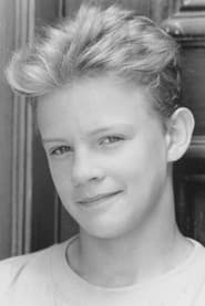 Simon Fenton as P.K. Age 12