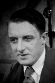 Henry Victor as Hammil - tall spy boss