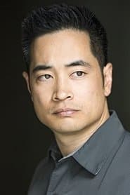 Ash Lee as Lester Kuriyama