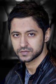 Ash Tandon as Lloyd Donovan