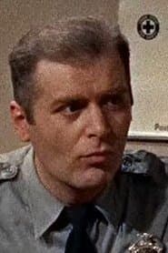 George Karas as Officer Ritchie