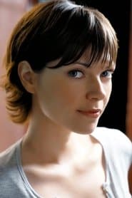 Nicole De Boer as Karen Mitchell
