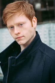 Alexander Lowe as August