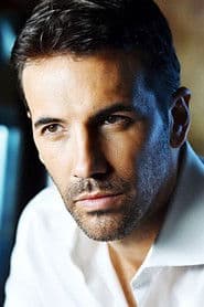 J.R. Cacia as Giles Lang