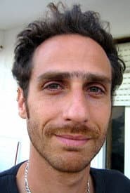 Ami Smolartchik as Benny Sagiv