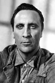 Timothy Carey as Flo