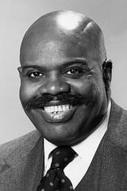 Ted Ross as Mr. Booth