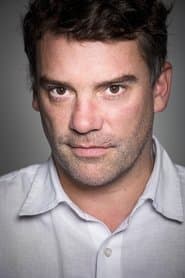 Diego Muñoz as Surfer