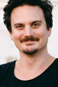 Paul Komadina as Police Officer