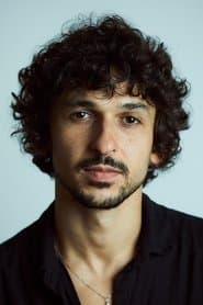 Ravel Andrade as Gustavo