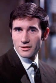 Jim Dale as Agent Carstairs
