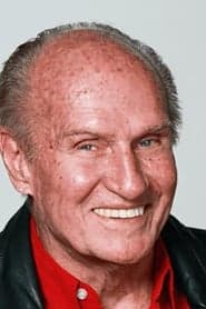 Roger Cudney as TV Announcer