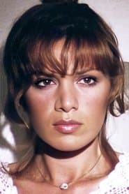 Rita Silva as The Warden