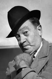 Tommy Handley as The Host