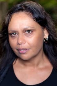 Paula Nazarski as The Bookstore Owner