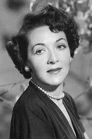 June Clayworth as Mme. Astrid Delambre