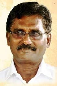Vela Ramamoorthy as Raghu's Father