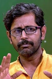 Rajesh Sharma as Father Manikuttan