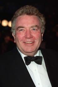 Albert Finney as Reggie Conyngham-Jervis