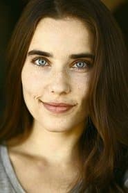 Alix Angelis as The Quiet One