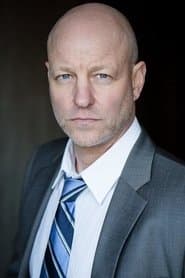 James MacDonald as Detective Frehill