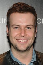 Taran Killam as Justin Davis