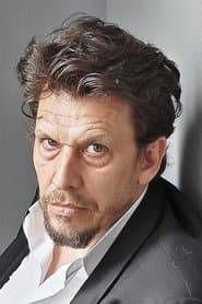 Philippe Résimont as Master Éric Grumbach