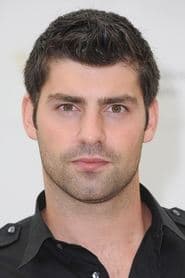 Travis Milne as Charlie