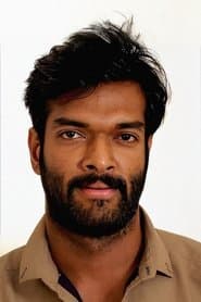 Charandeep as Puliyampatti Tigers Wrestler