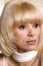 Mireille Darc as Caroline Harrington "Tchoo-Tchoo"