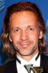 Michael Riley as Greg