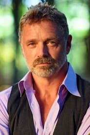 John Schneider as Jim Harwood