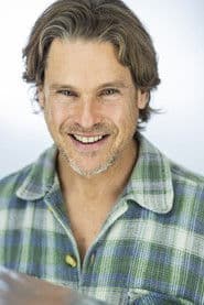 William McNamara as Reverend Young