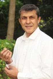 Sanjay Sharma as Baba