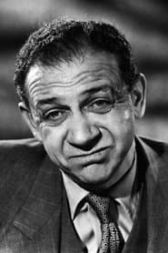 Sidney James as Ebenezer Scrooge