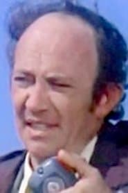 Norman Fields as Shop Owner