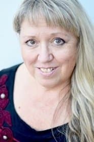 Johanne Léveillé as Service Station Employee