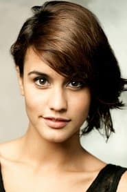 Megan Montaner as Adela