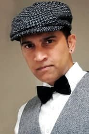 Giju John as Achuthan