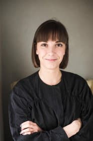 Anta Aizupe as House Owner's Wife