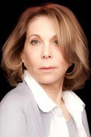 Tanya Lopert as La première dame